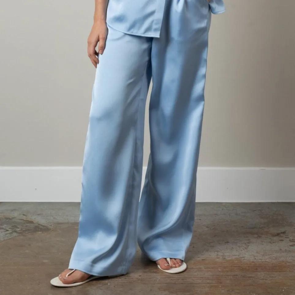 Soft blue trousers with fluid drape Front view, Elizabethan World