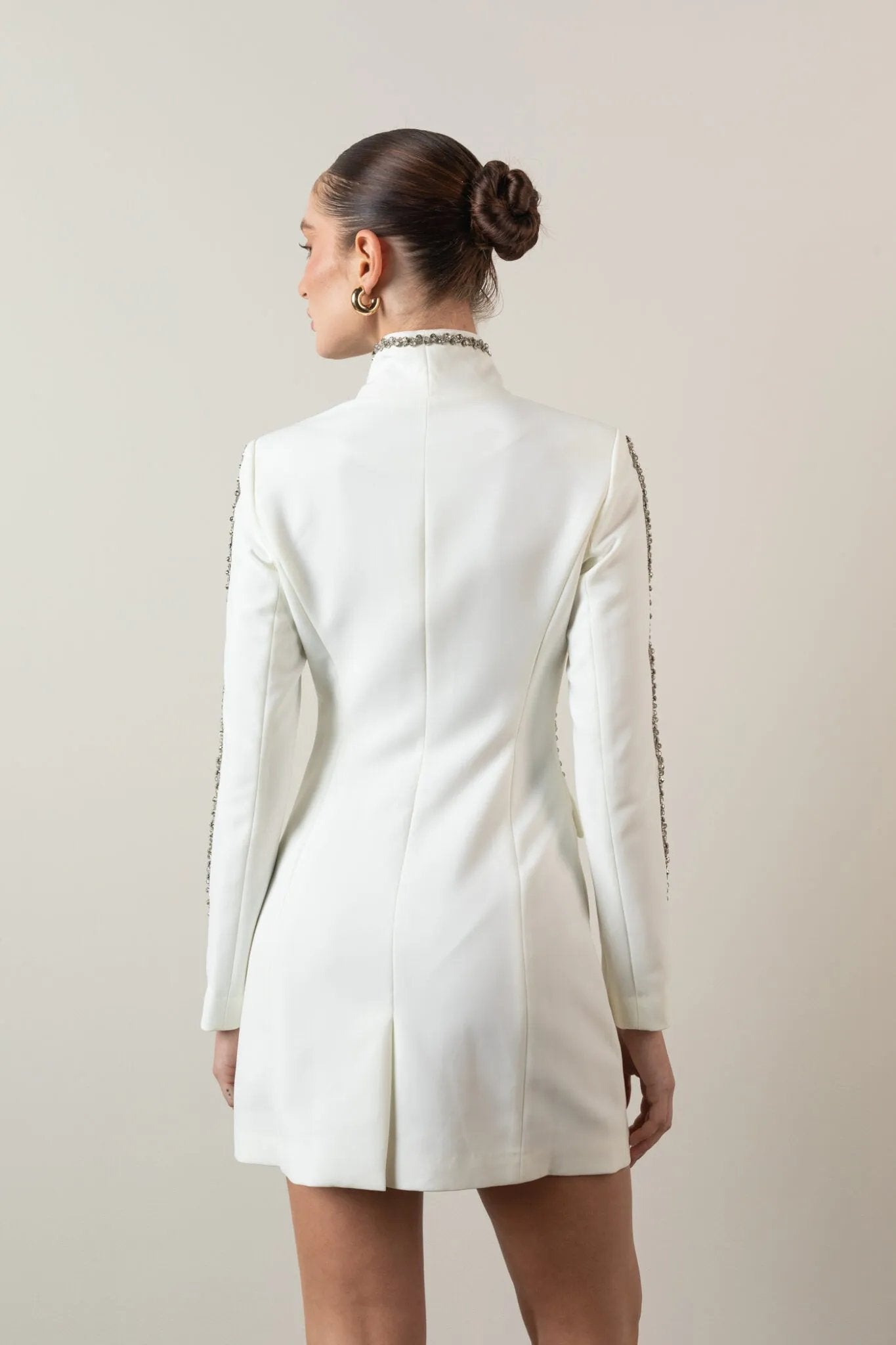 White crystal-embellished blazer dress on model Back view, Elizabethan World